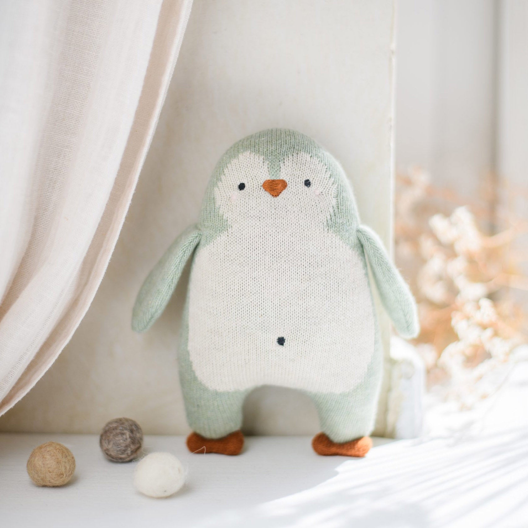 Babyrassel Pinguin - mint