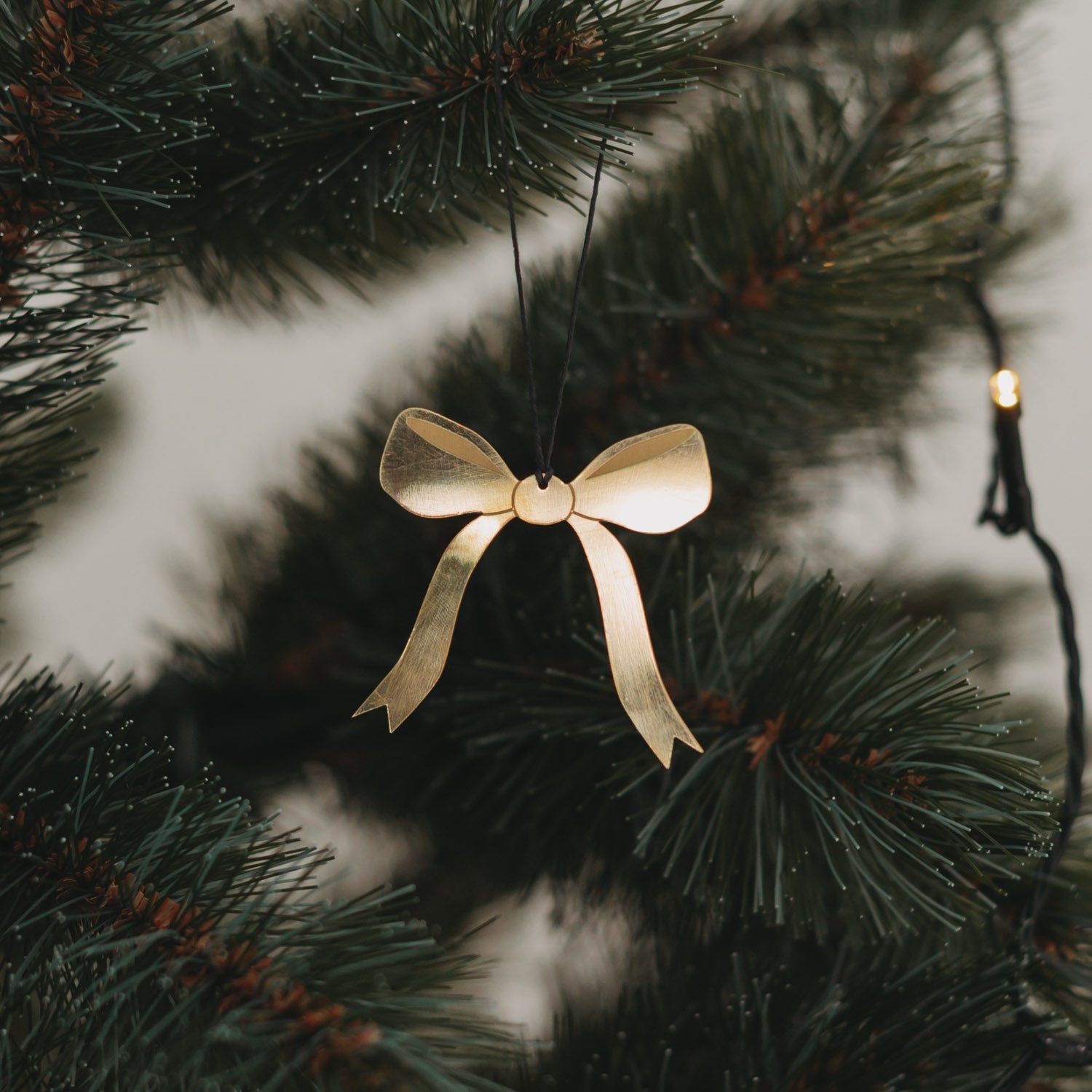 Metallanhänger Schleife - gold