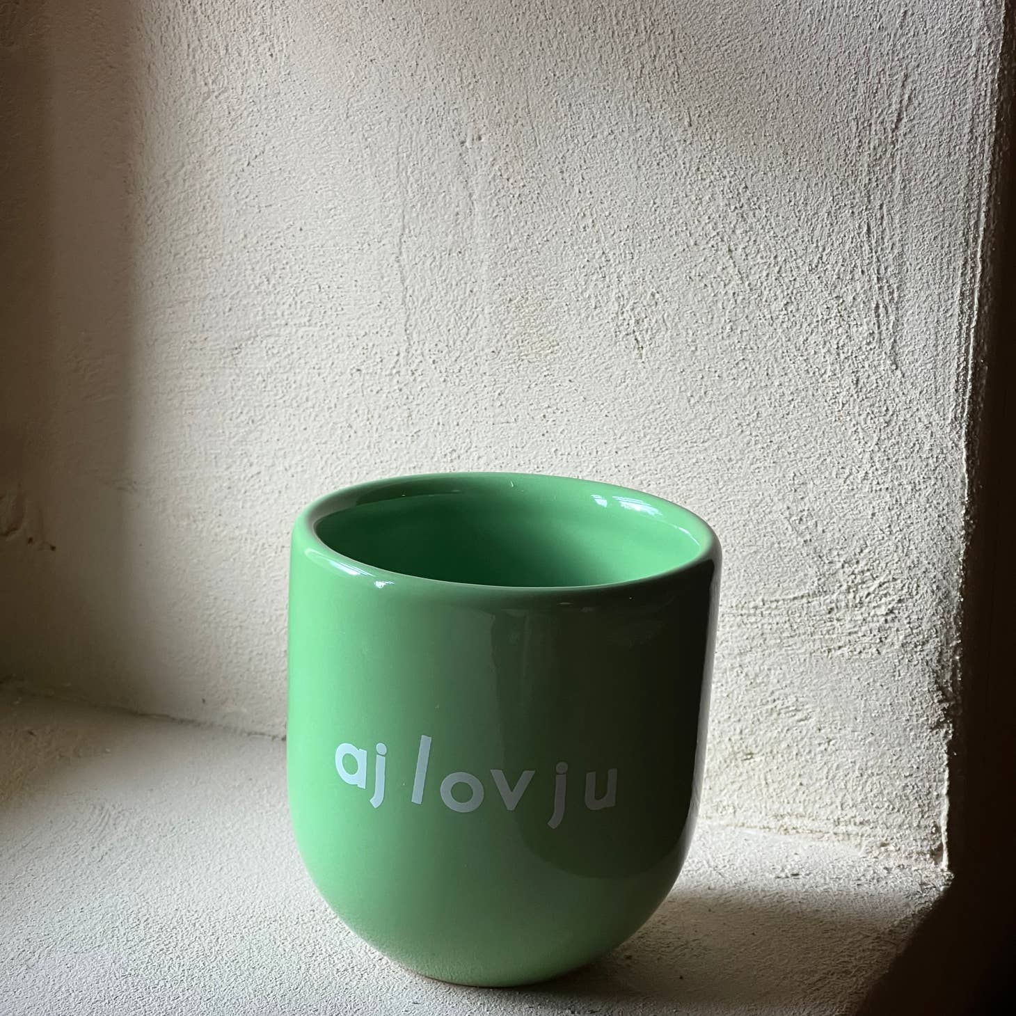 Becher AJ LOV JU- grün