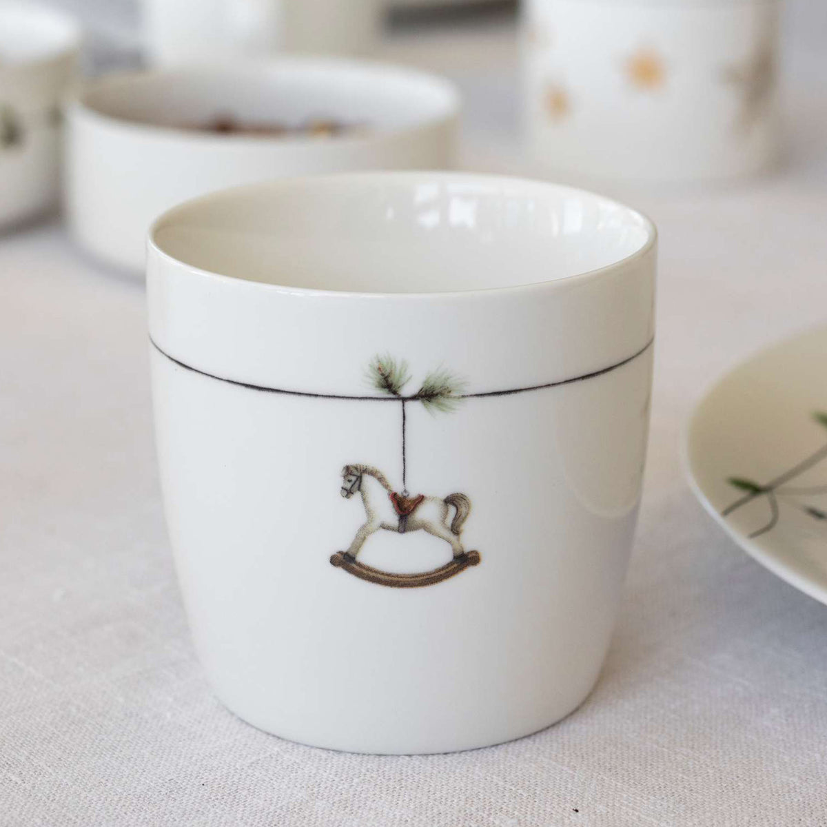 Sögne Weihnachtstasse - Schaukelpferd